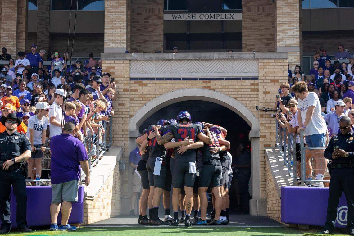 The TCU Horned Frogs football team huddles before the beginning of their game against OSU at the Amon G. Carter Stadium in Fort Worth, on Saturday, Oct. 16, 2022.