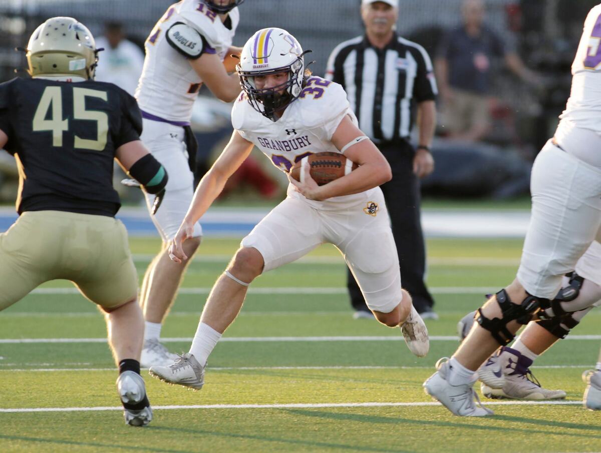 Grandbury’s Gage Archer finds a hole in the Birdville defense during their game Thursday night at Birdville Athletic Center. JOHN ROWLAND