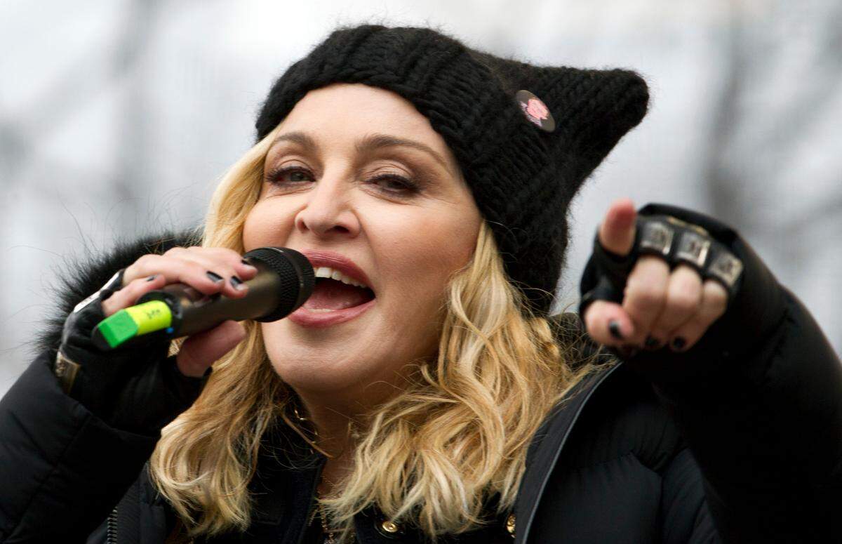 FILE - In this Jan. 21, 2017 file photo, Madonna performs on stage during the Women’s March rally in Washington. (AP Photo/Jose Luis Magana)