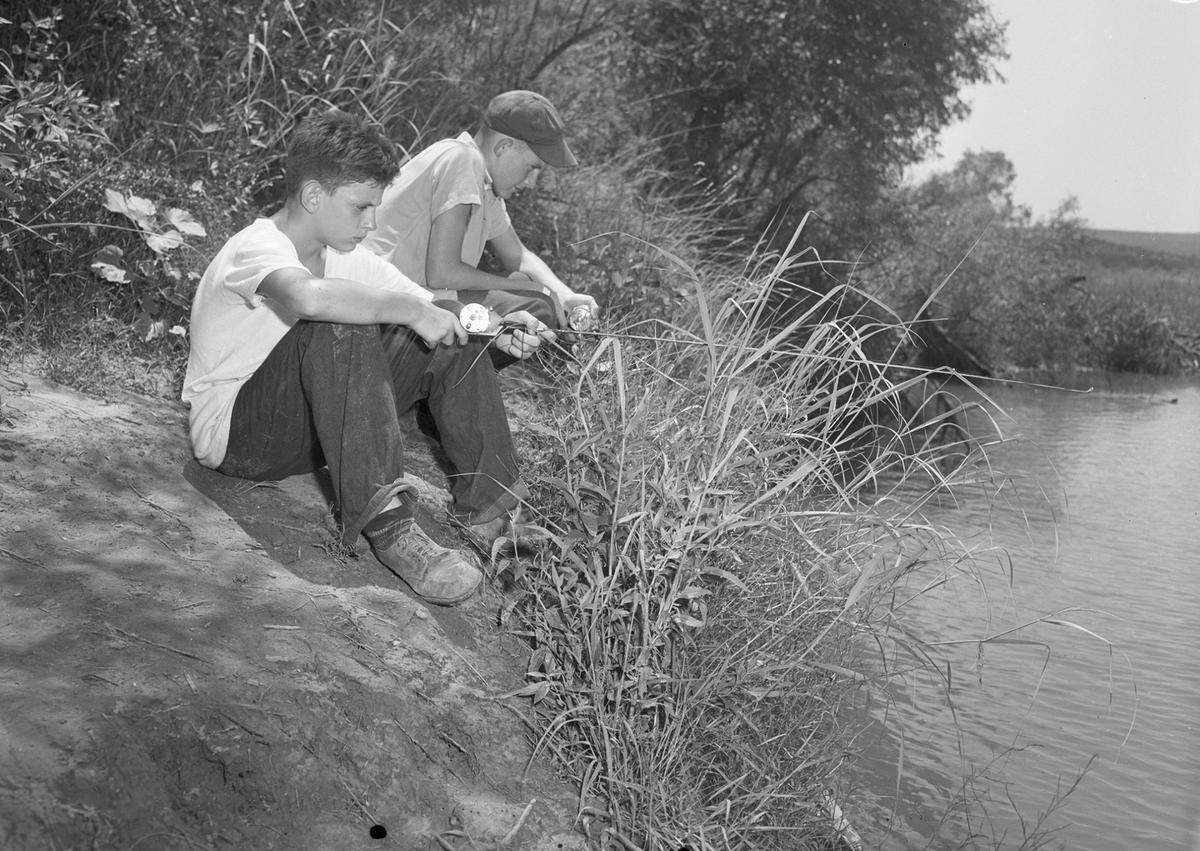 July 26, 1944: Fishing in the Brazos River are Walter Spears, left, son on Mr. and Mrs. Lloyd B. Spears, and Eddie Wilkinson, son of Mr. and Mrs. Ted Wilkinson, both of Fort Worth.