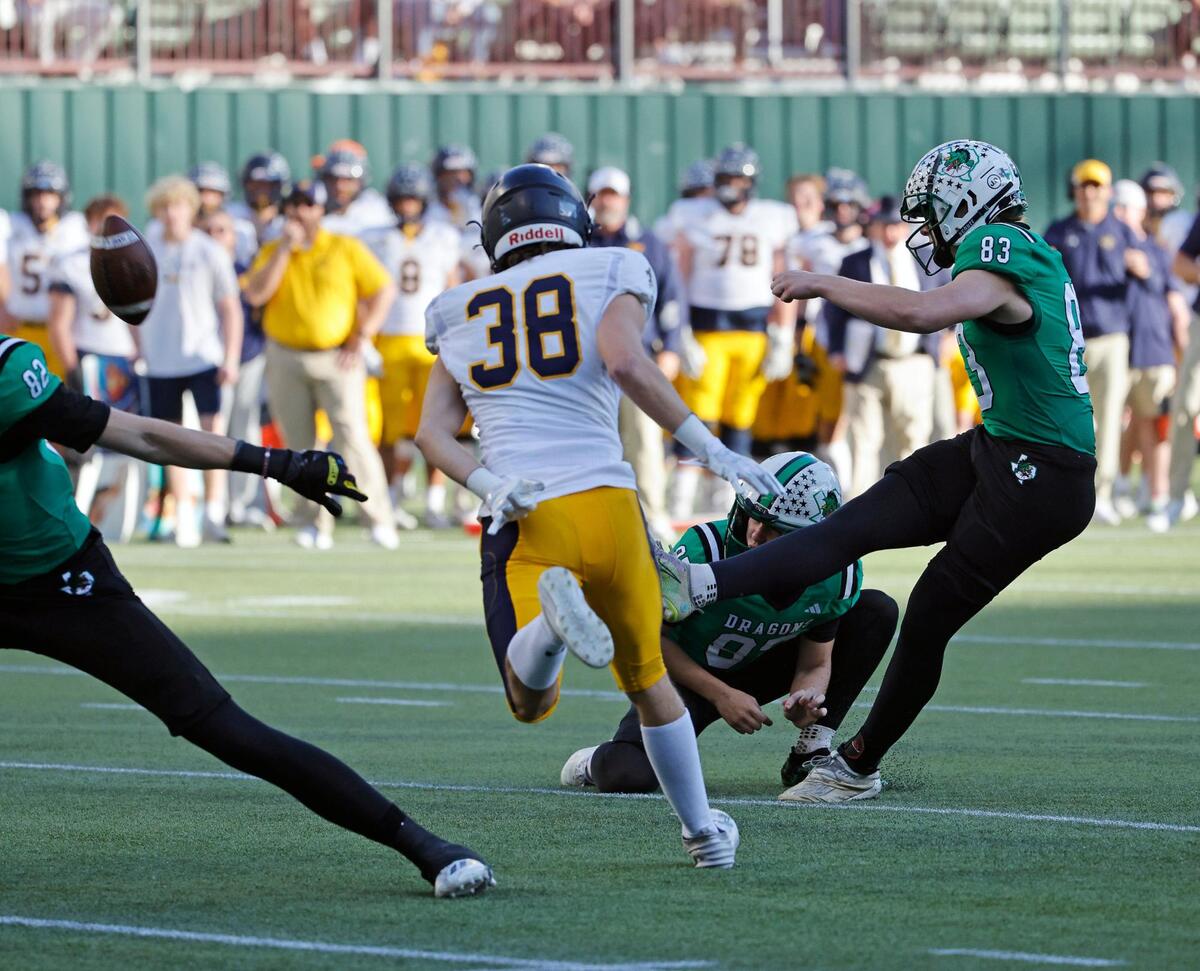 Carroll kicker Kyle Lemmermann (83) puts a point after through in the first half of a UIL Conference 6A Division 2 region football playoff game at Choctaw Stadium in Arlington, Texas, Friday, Nov. 24, 2023.