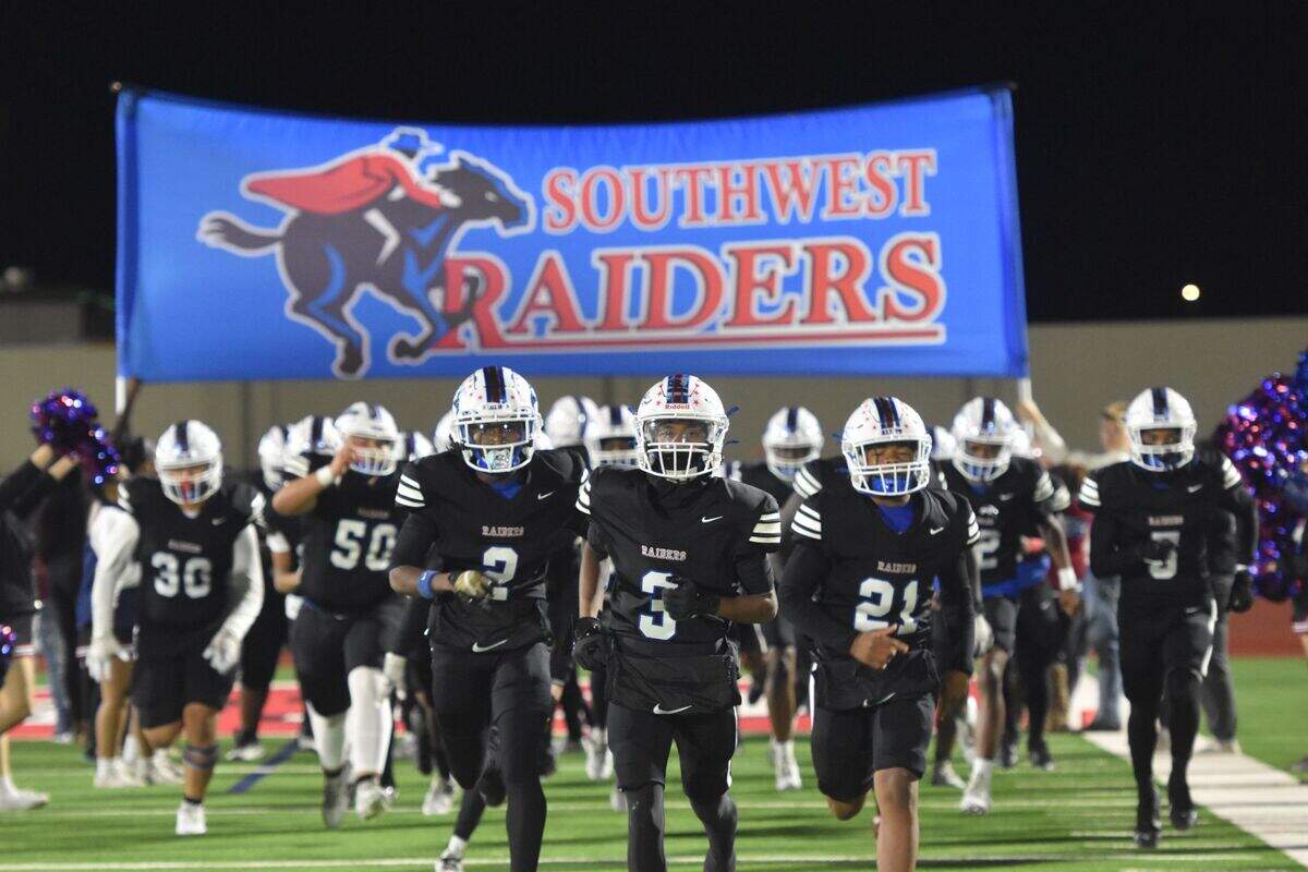 Fort Worth Southwest runs onto the field during a high school football game against Decatur at Clark Stadium in Fort Worth, Texas Friday, November 8, 2024.