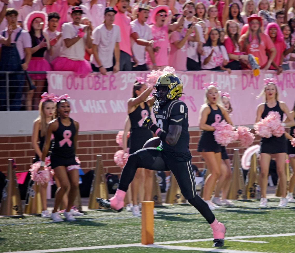 Mansfield wide receiver Jacobe Hayes (0) high steps across the goal line for the Tigers second touchdown during a UIL football game at Vernon Newsom Stadium in Mansfield Texas, Thursday, Oct. 03, 2024.
