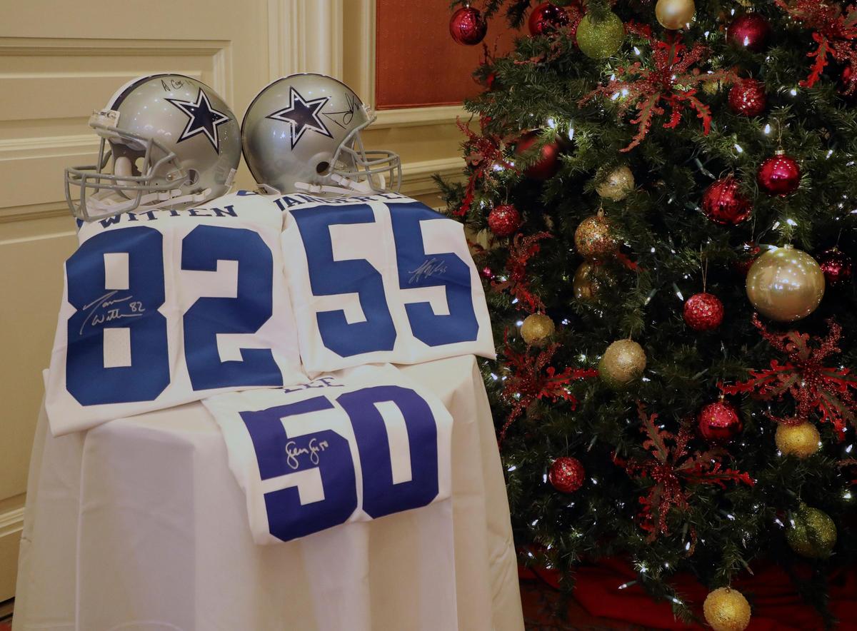 Donated, signed, Cowboy items brought large amounts close to the end of the Exchange Club’s annual Christmas fund raiser luncheon for the Goodfellow Fund at the Fort Worth Club in Fort Worth, Texas, Wednesday, Dec. 11, 2019. They raised $300,325. (Special to the Star-Telegram Bob Booth)