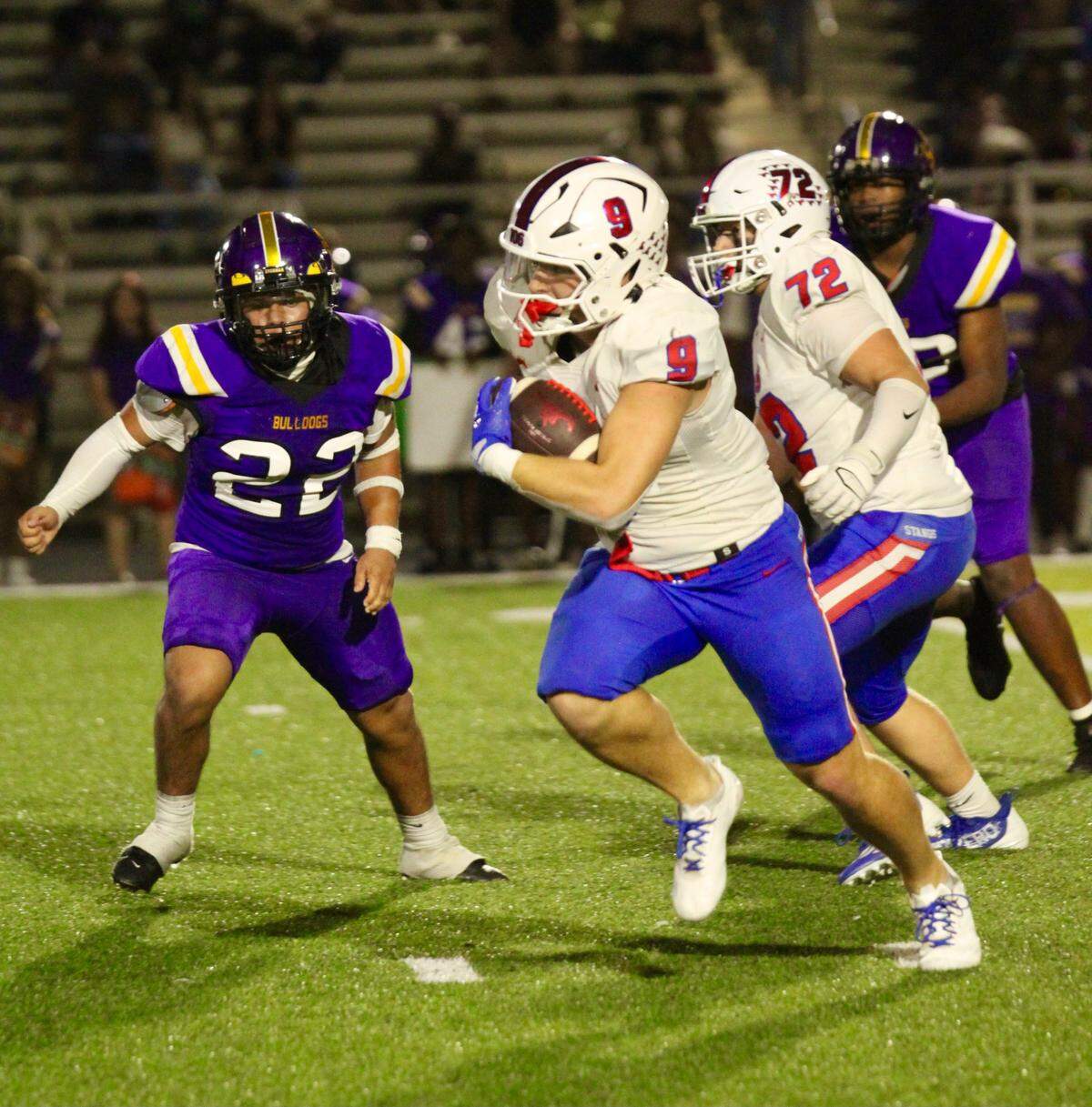 Grapevine running back Jake Graham (9) picks up yardage against Everman in a District 3-5A D2 game on Friday, September 12, 2025 at Marr Stadium in Everman, Texas.