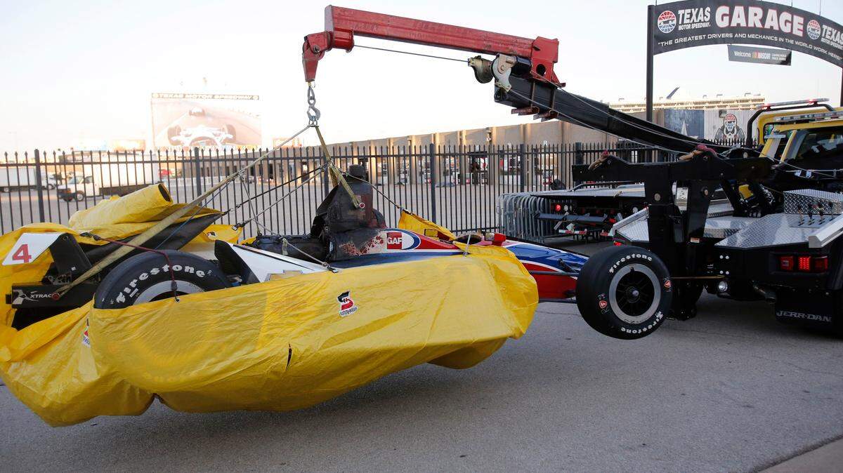 The No. 4 Chevrolet for A.J. Foyt Enterprises, driven by Matheus Leist, is carried to the garage in the Verizon Indycar Series DXC Technology 600 at Texas Motor Speedway in Fort Worth, Texas, on June 9, 2018.