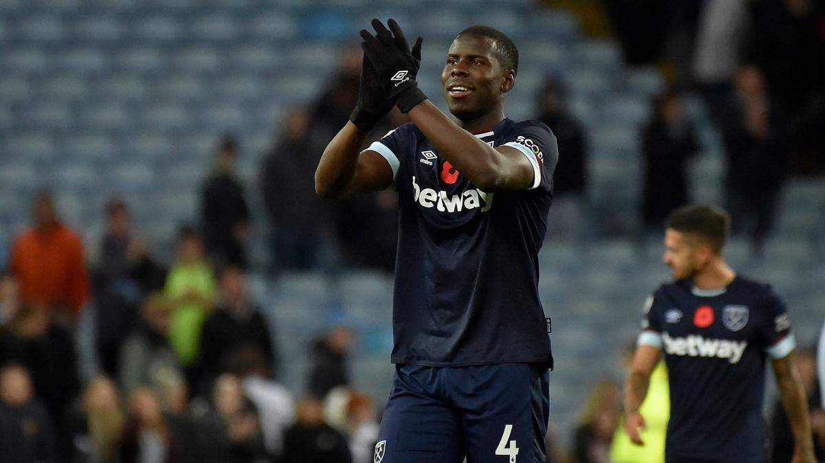 West Ham’s Kurt Zouma celebrates at the end of the English Premier League soccer match between Aston Villa and West Ham United at Villa Park in Birmingham, England, Sunday, Oct. 31, 2021. West Ham won 4-1. (AP Photo/Rui Vieira)