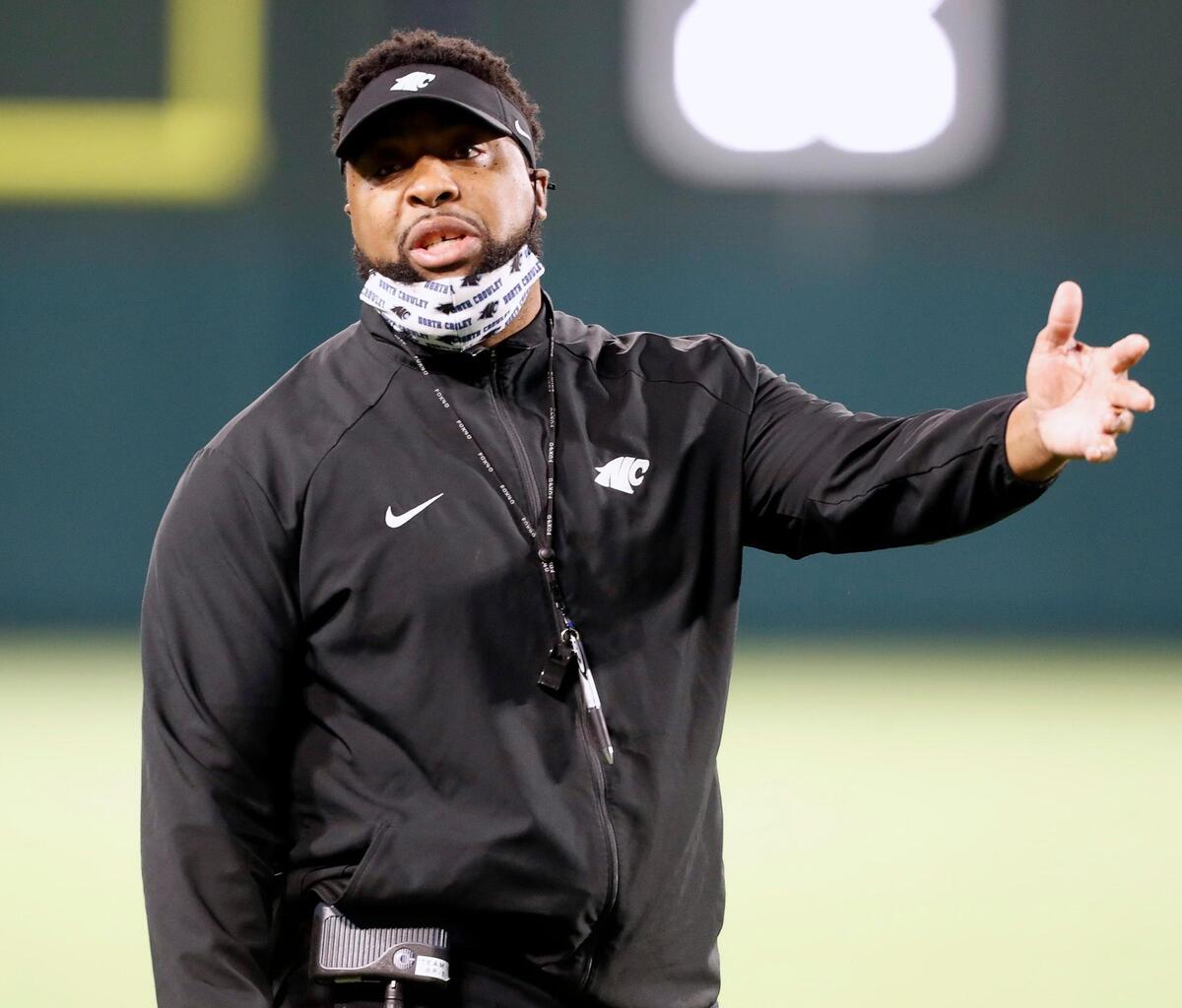 North Crowley head coach Courtney Allen has a few words for an official on the sidelines during a high school 6A Division 2 bi-district football playoff game at Globe Life Park in Arlington, Texas, Friday, Dec. 11, 2020. North Crowley defeated Byron Nelson 23-16. (Special to the Star-Telegram Bob Booth)