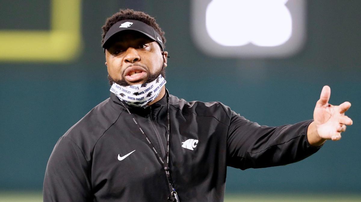 North Crowley head coach Courtney Allen has a few words for an official on the sidelines during a Class 6A Division II bi-district playoff game Dec. 11, 2020, at Globe Life Park in Arlington. North Crowley defeated Byron Nelson 23-16.