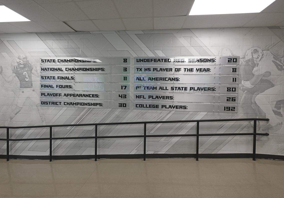 Southlake Carroll football’s history of accomplishments is displayed on a wall