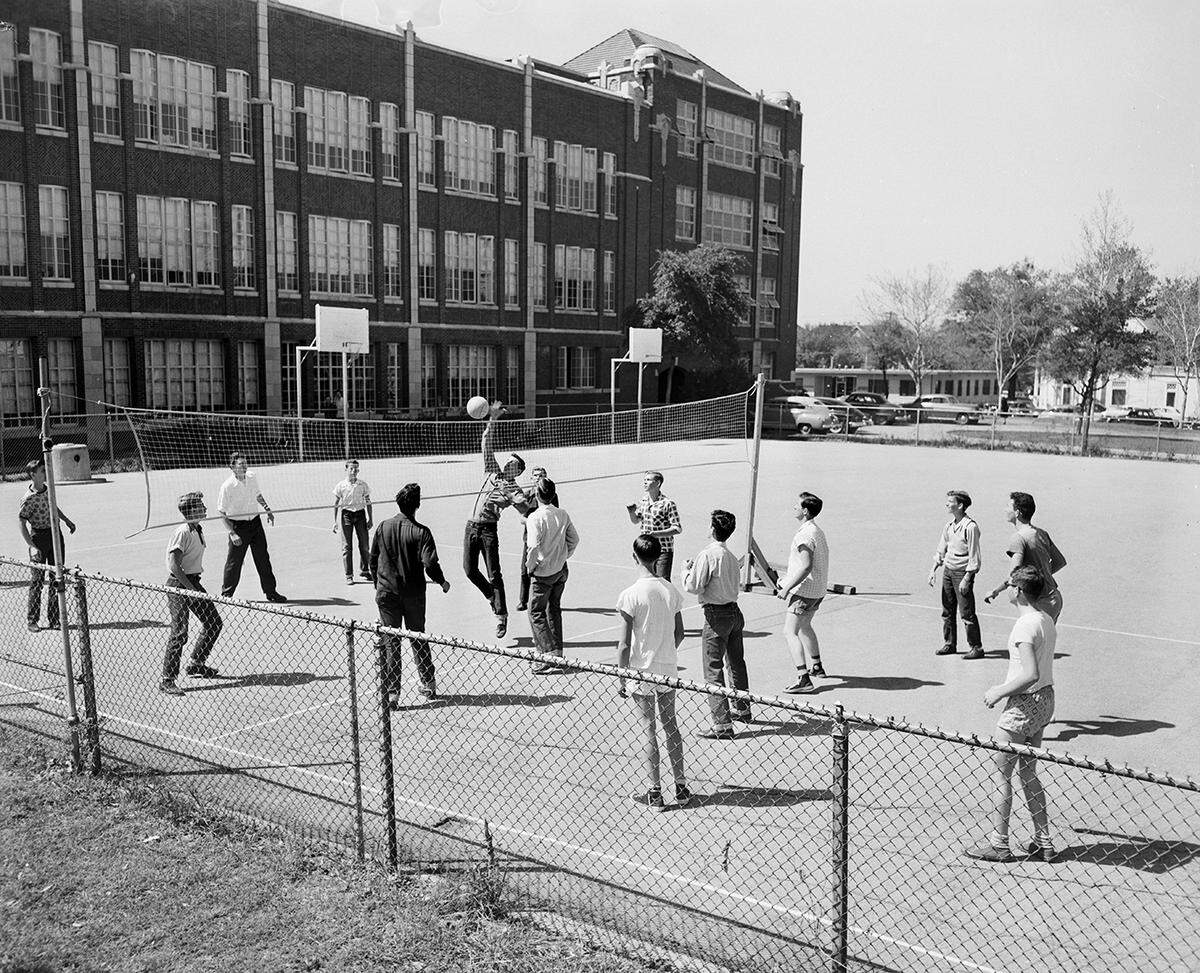 April 1, 1952: “Organized recreation is one of the many ways of taking up free time on the hands of teen-agers. One of the big problems is not so much lack of facilities but directing the youth into a program in which he will become interested.” Photo shows students playing volleyball at Paschal High School in Fort Worth.