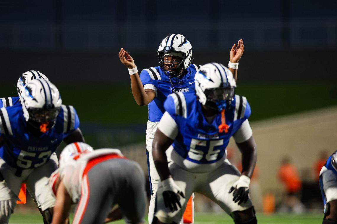 North Crowley quarterback Demarcus Harris changes the play before taking the snap in a non-district game between North Crowley and Rockwall at Crowley ISD Stadium in Crowley, Texas on Sept. 18, 2025.
