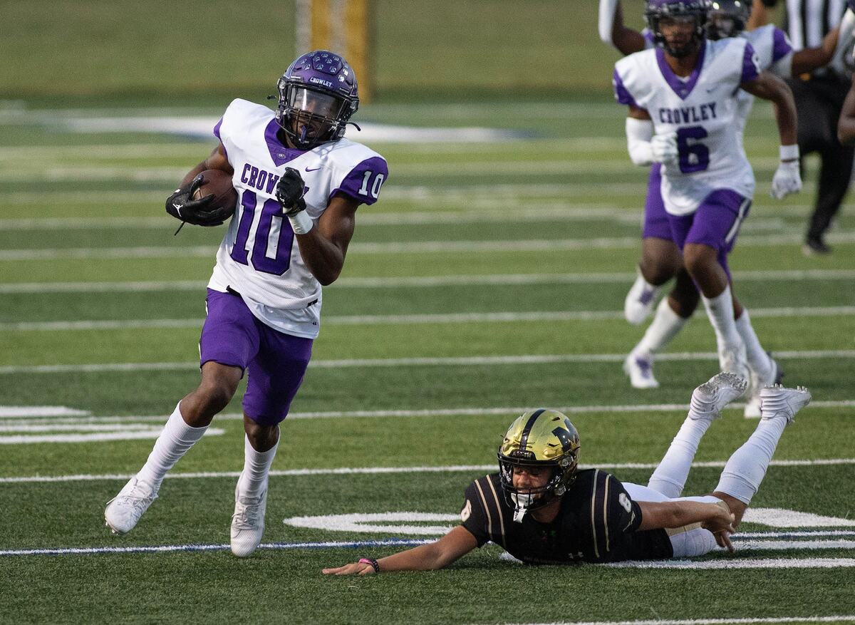 Crowley’s Zambian Burton takes the opening kickoff to a big gain setting up a Crowley touchdown on the next play during a UIL football game at Newsome Stadium on Saturday , October 10, 2024.
