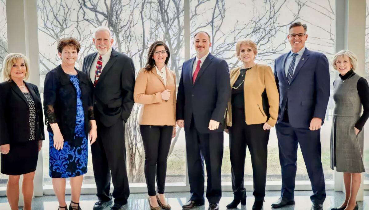 The Northwest school board (from left): Dr.. Lillian Rauch, Judy Copp, Mark Schluter, Jennifer Murphy, superintendent Dr. Mark Foust, Deanne Hatfield, Steve Sprowls and Dr. Anne Davis-Simpson.