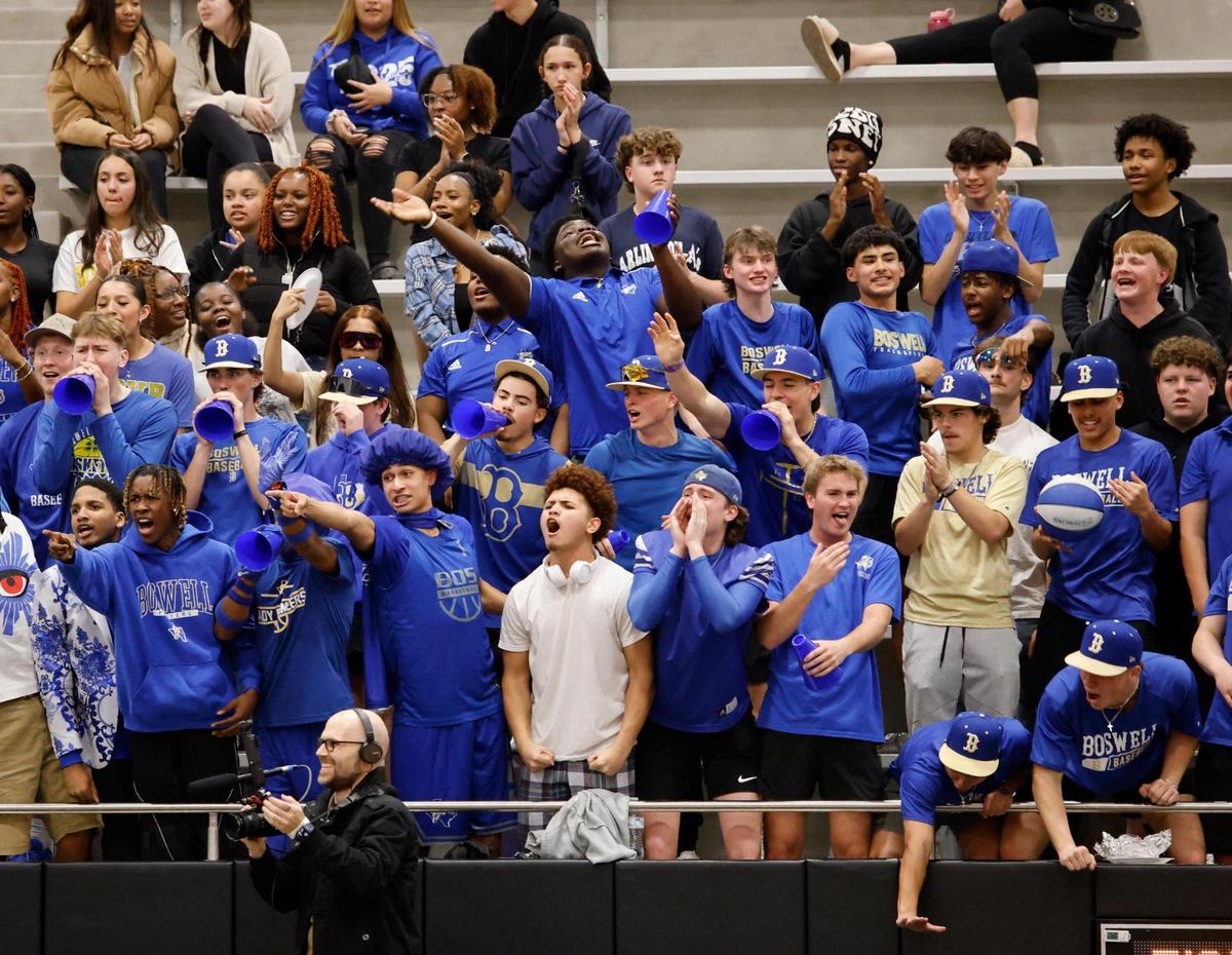 The Fort Worth Boswell student section reacts to a play on the defensive side during the second half of the UIL Class 6A D2 state semifinal girls basketball game against Lancaster at The Colony High School in The Colony, Texas, Tuesday, Feb. 25, 2025.