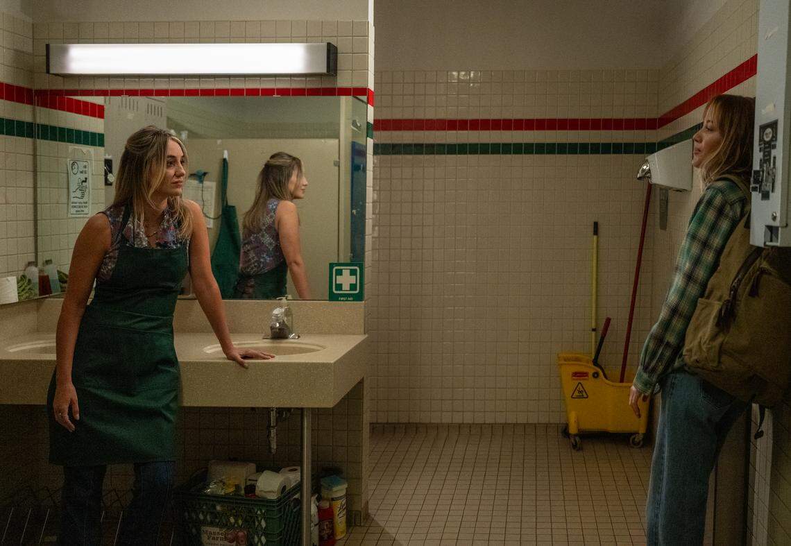 (From left) Amy Matthews (Lainey Wilson) and Kenna Rowan (Maika Monroe) in “Reminders of Him,” directed by Vanessa Caswill.