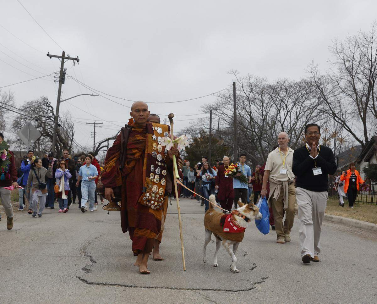 Buddhist monks who walked nearly 2,300 miles to Washington D.C. for Peace arrive back to the Húóng Do Vipassana Bhavana Center in Fort Worth, Texas, Saturday Feb. 14, 2026.