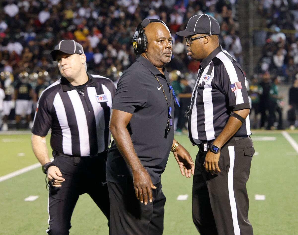 Duncanville head coach Reginald Samples returns to the sidelined after talking with officials during a District 11-6A football game at Eagle Stadium in DeSoto, Texas, Friday, Oct. 11, 2024.