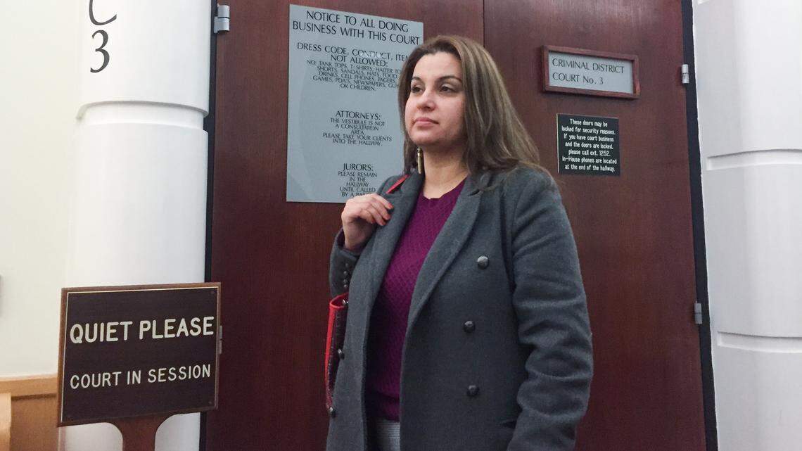 Defendant Desiree Boltos leaving the courtroom after the first day of her trial for allegedly scamming six elderly people out of $1.6 million.