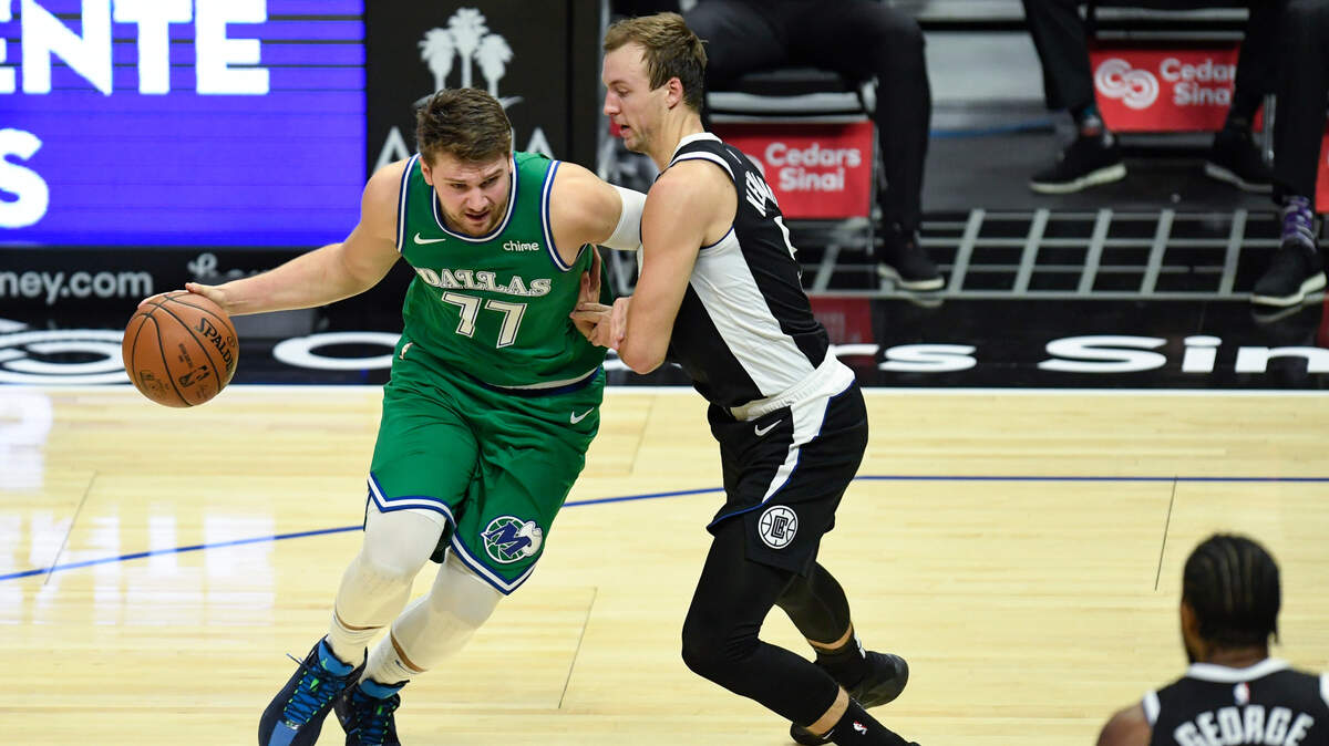 Dallas Mavericks and guard Luka Doncic, left, will play the Utah Jazz in Utah on Christmas Night on ESPN. The Mavs and Jazz game will cap a five-game slate of Christmas Day games.