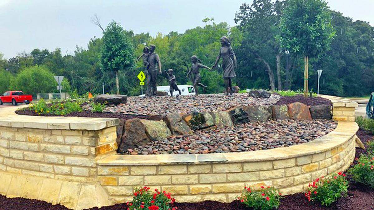 The Jackson and Cheek-Sparger Roundabout in Colleyville now has something pretty in the middle. The recent beautification project, one of several planned for the city this fiscal year, includes sculptures named “Families are Forever.”