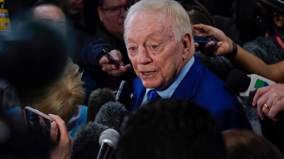 Dallas Cowboys owner Jerry Jones speaks to reporters following an NFL football game between the Cowboys and the Green Bay Packers on Sunday.