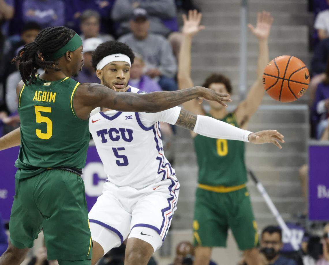 TCU forward Micah Robinson (5) watches as Baylor guard Obi Agbim (5) passes the ball to the outside during the first half of a NCAA basketball game between Baylor University and TCU at Schollmaier Arena in Fort Worth, Texas, Saturday Jan. 03, 2026
