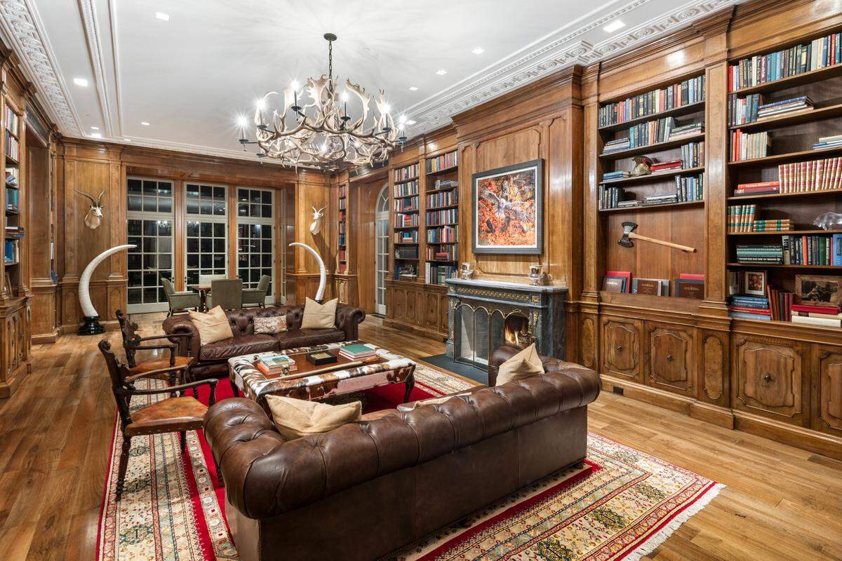 The library is next to the Grand Salon so guests can flow room to room and enjoy a moment of quiet.