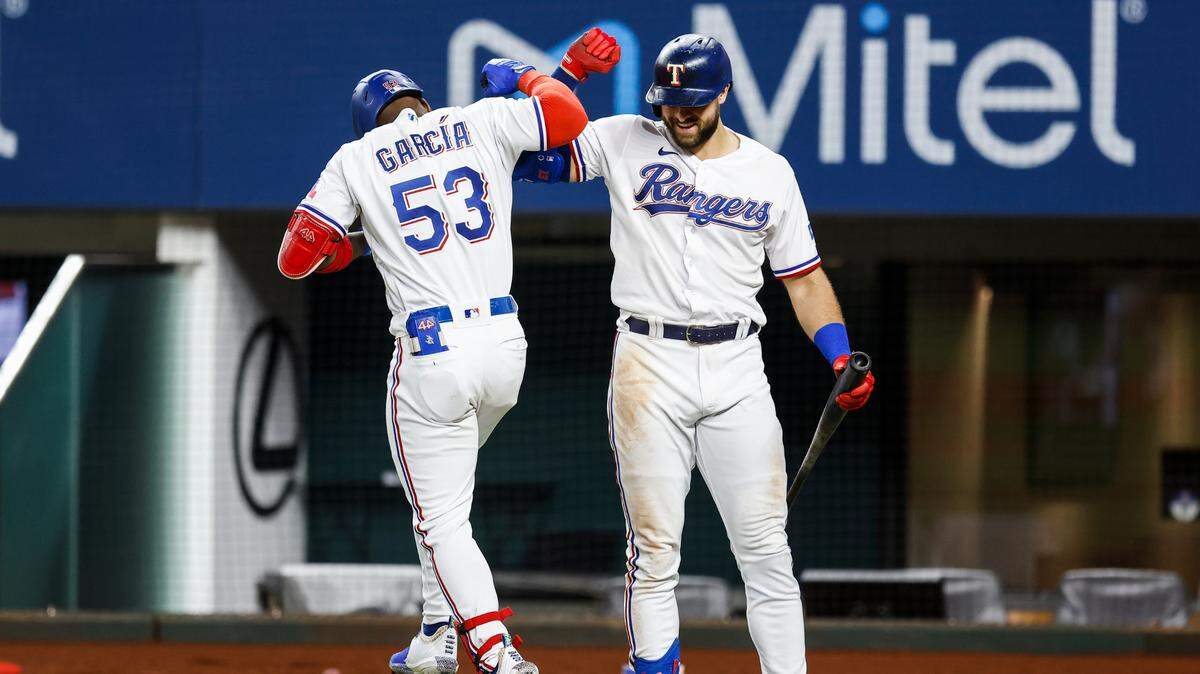 Texas Rangers’ Adolis Garcia, left, and Joey Gallo, right, along with pitcher Kyle Gibson earned All-Star honors on Sunday. It’s the first for the rookie Garcia and nine-year veteran Gibson, and the second for Gallo.