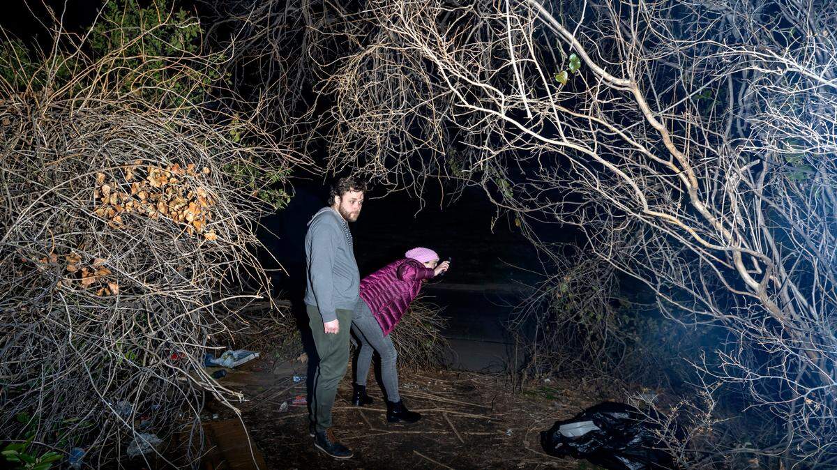 Tarrant County Homeless Coalition planning data analyst Katie Welch and volunteer Alex Bihm search for a camping site during an annual count of the homeless population in January. Black people are dis-proportionally represented in the county’s homeless population.