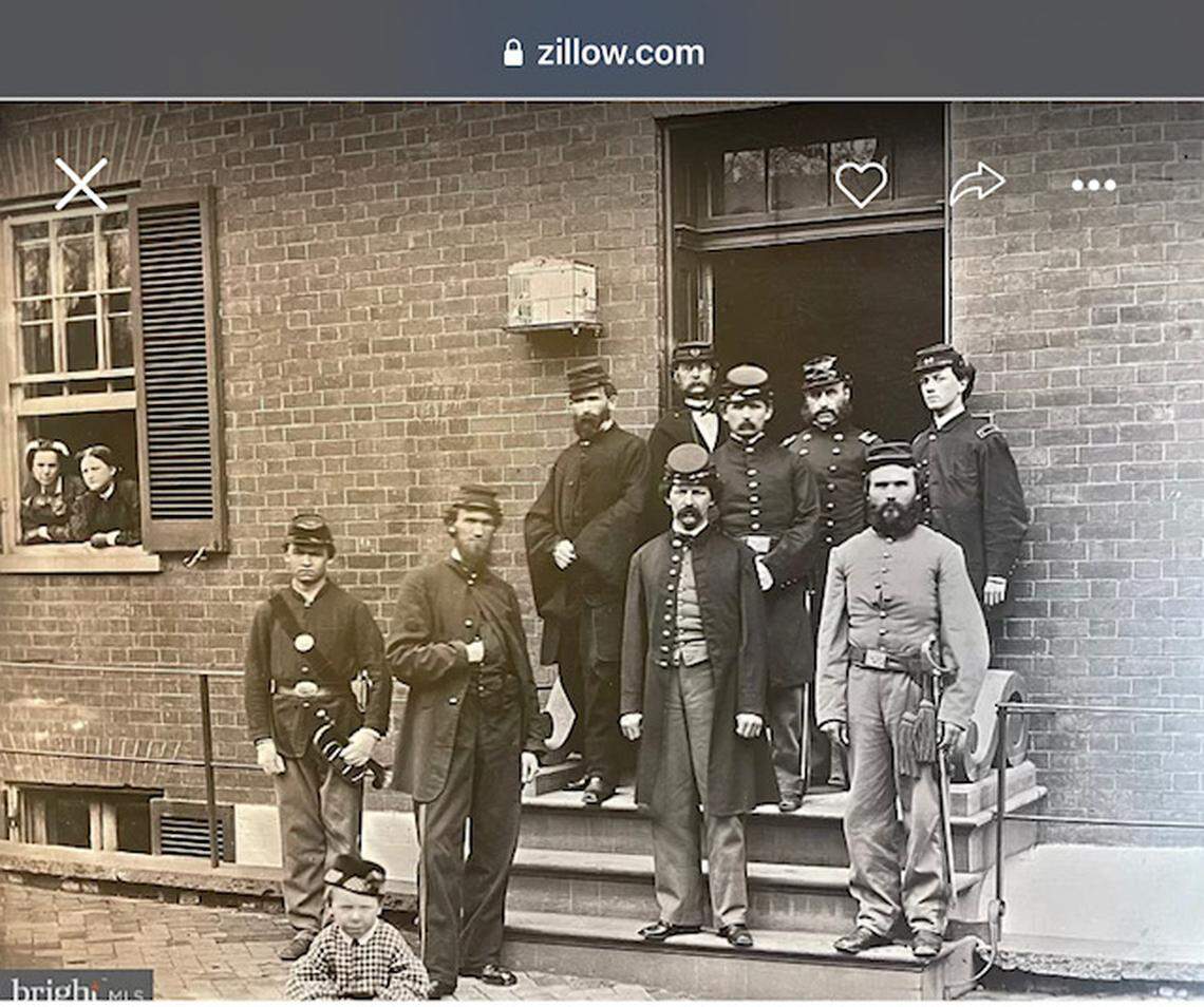 Soldiers stand in front of the hospital