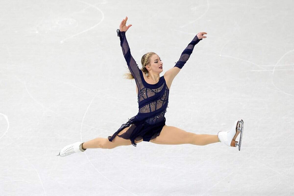 MILAN, ITALY - FEBRUARY 08: Amber Glenn of Team United States competes in Women's Single Skating - Free Skating Team Event on day two of the Milano Cortina 2026 Winter Olympic games at Milano Ice Skating Arena on February 08, 2026 in Milan, Italy. (Photo by Vittorio Zunino Celotto/Getty Images)