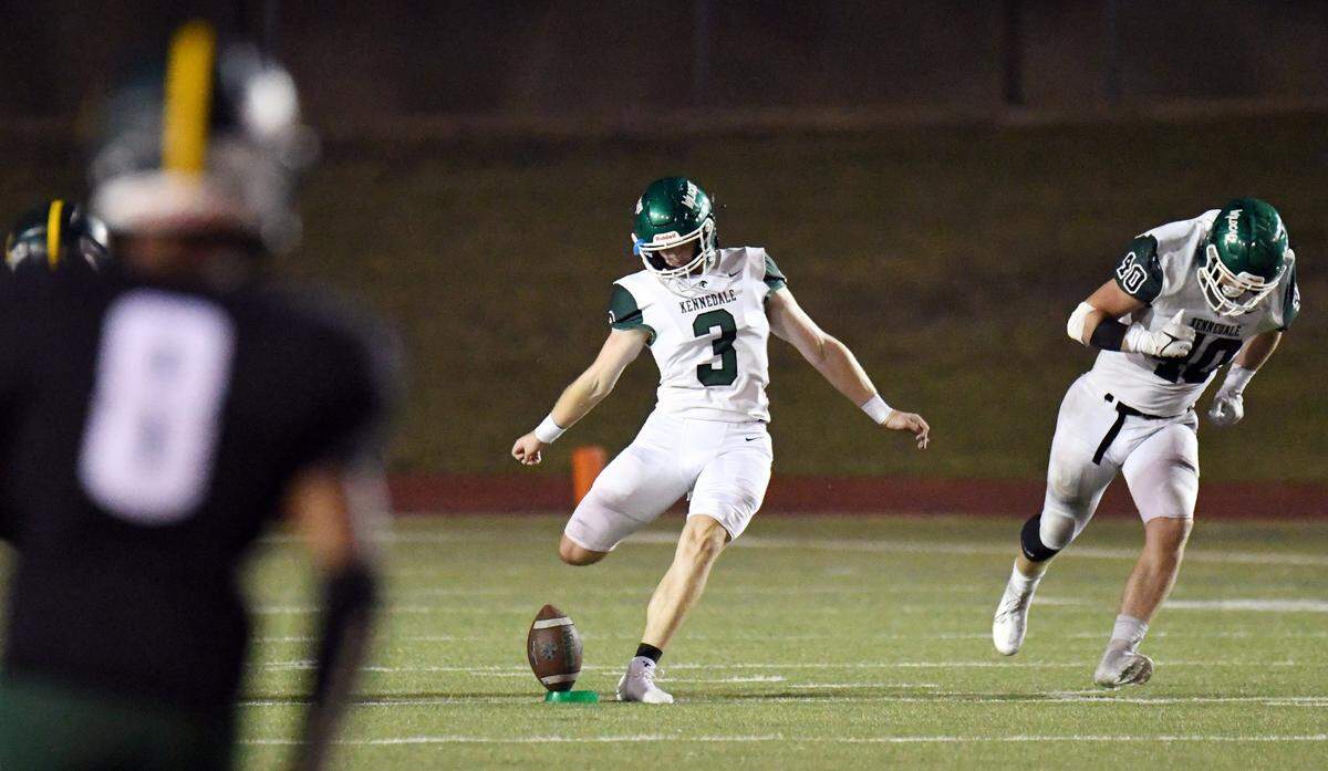 Kennedale kicker Aidan Birr, center kick offs the ball after making a field goal to take a 40-14 final lead over Wester Hills in the fourth quarter of their District 6-4A Division 1 football game at Farrington Field in Fort Worth, Texas. Special/Bob Haynes