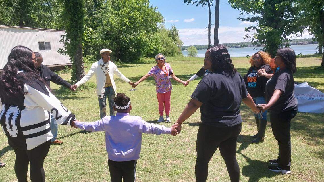 Around a dozen people gathered at Living Waters Park in east Fort Worth on Saturday afternoon to remember loved ones lost to violence.
