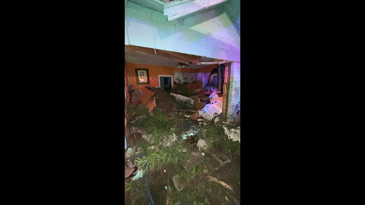 A family narrowly escaped injury when a hit-and-run driver crashed into the living room of their east Fort Worth home early Sunday.