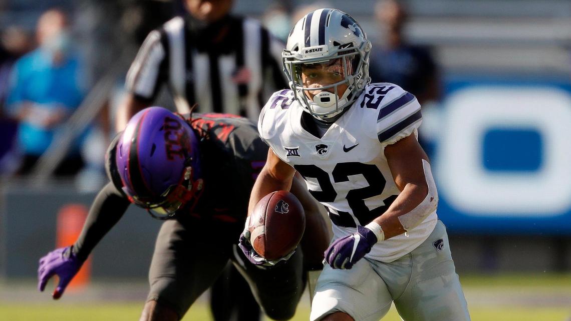 Kansas State running back Deuce Vaughn breaks for extra yardage against TCU in Fort Worth, Texas, Saturday, Oct. 10, 2020.