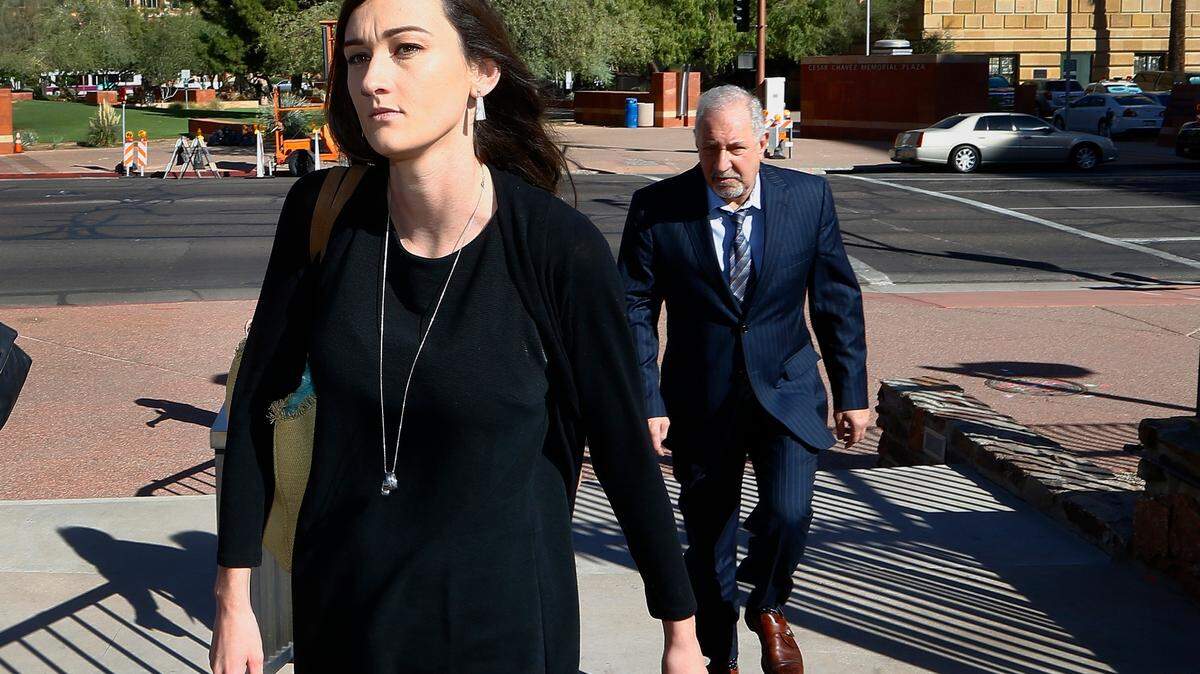 Laney Sweet, left, widow of Daniel Shaver, arrives Oct. 25, 2017, at Maricopa County, Ariz., Superior Court in Phoenix with attorney Mark Geragos, right, for opening statements in the trial of former Mesa, Ariz., Police Officer Philip Brailsford, charged with murder in the fatal 2016 shooting of the unarmed Shaver. On Tuesday, Nov. 22, 2022, Sweet agreed to settle her wrongful death lawsuit. A notice of settlement filed in federal court in Arizona shows that Sweet and her two children will receive $8 million from the city of Mesa.