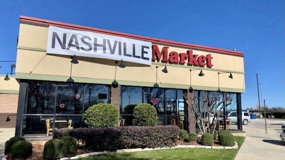 A sign switch at the east Arlington location premieres the new “Nashville hot” chicken at Boston Market.