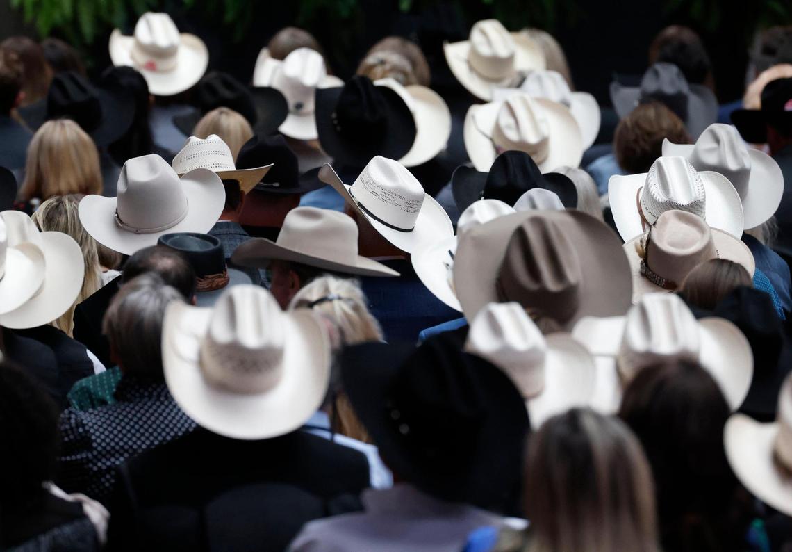 The rodeo floor was filled with cowboys during a memorial service for world champion calf roper Roy Dale Cooper at Cowtown Coliseum in Fort Worth on Monday.