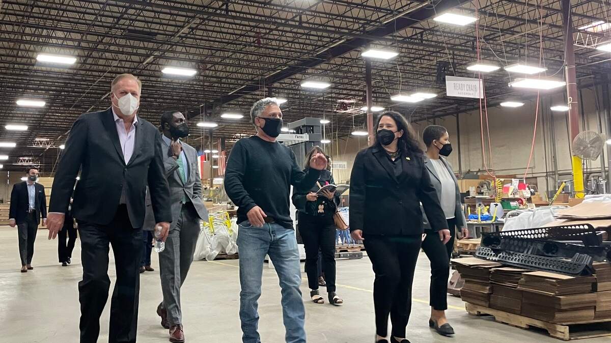Left to right, Arlington Mayor Jim Ross, Paragon Furniture CEO Ricky Kassanoff and U.S. Small Business Administration head Isabella Guzman tour Paragon’s production facility in Arlington. Guzman stopped at the small Arlington business to talk about its needs as it recovers from the economic impacts of the pandemic, and how SBA assistance helped Paragon Furniture survive.
