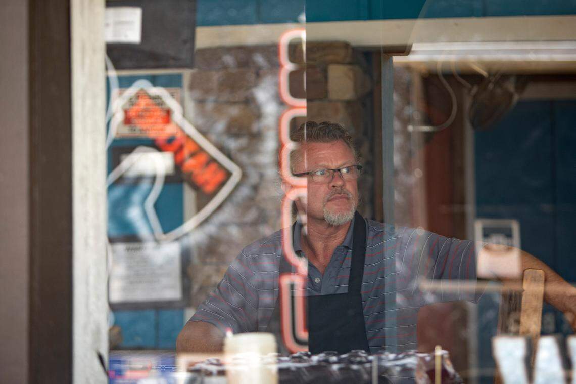 Hatchet House BBQue food truck owner Gary Cox has been cooking for days to serve first responders after a wildfire began Monday on the shore of Possum Kingdom Lake in Graford, Texas.