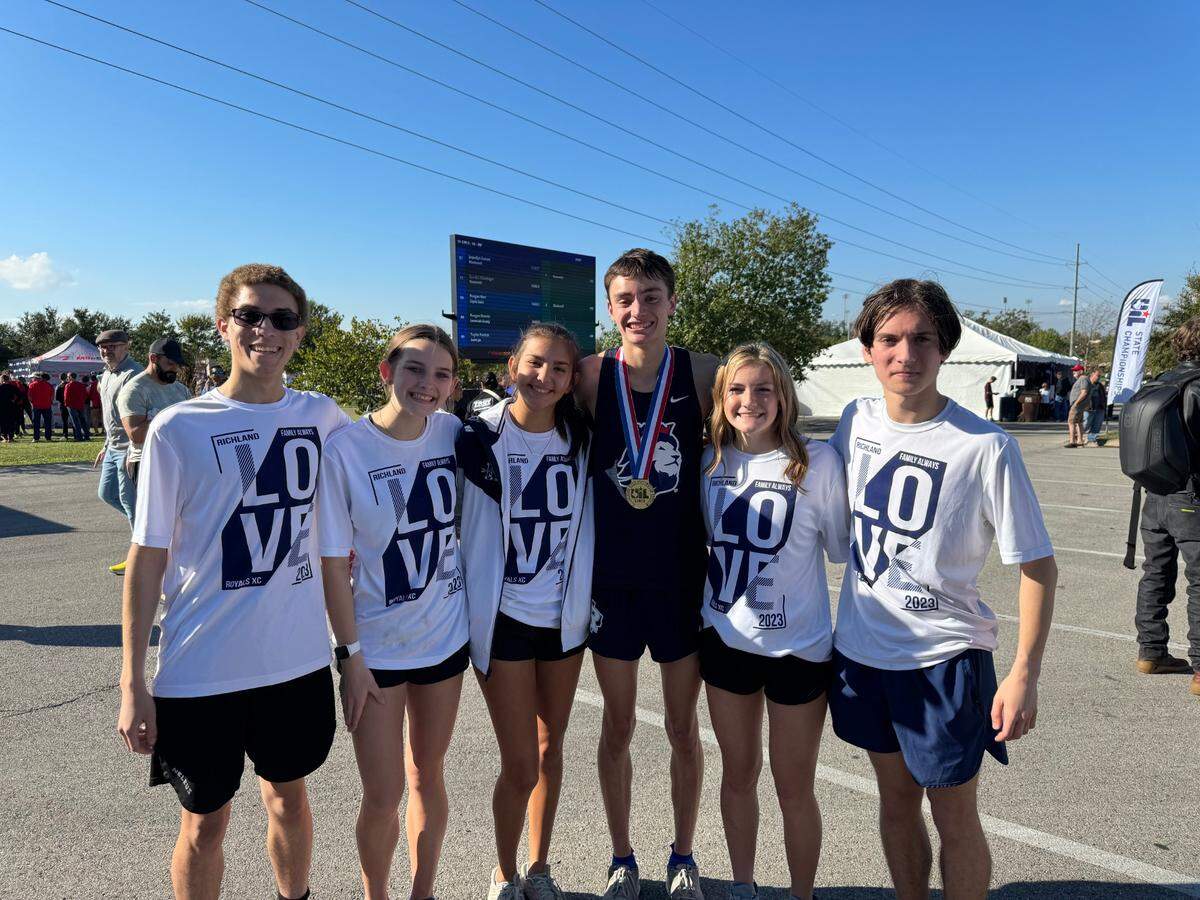 Ethan Gonzalez shares a moment with his teammates: Steven Bowman, Reagan Wilson, Bella Hernandez, Rylee Robinson and Evan Thompson.