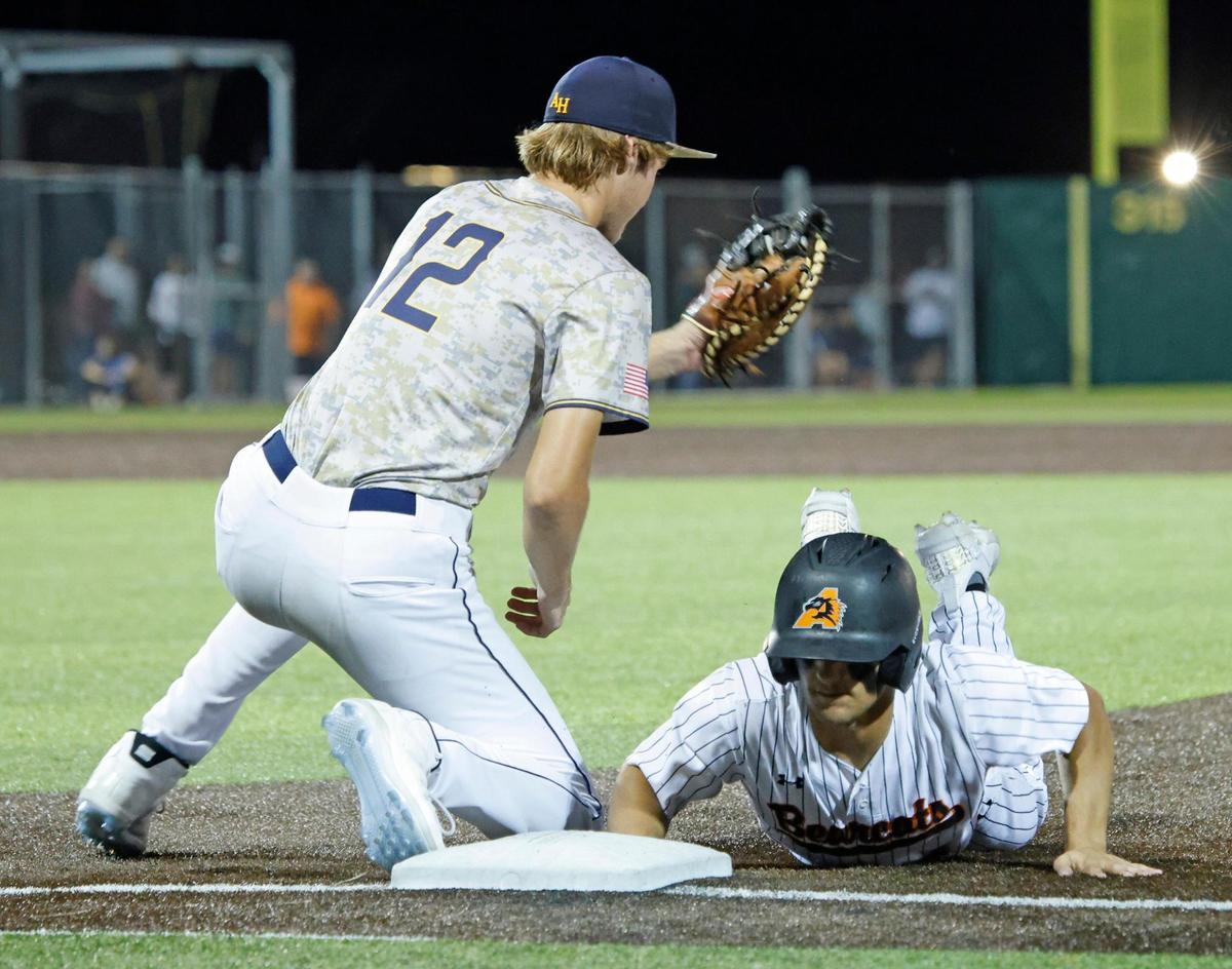 Aledo third baseman Blake Burdine (6) dives back to first ahead of the tag by Arlington Heights first baseman Mitchell Carpenter (12) during a UIL Area Round 5AD1 baseball playoff game at Bearcat Field in Aledo, Texas, Thursday, May 08, 2025.
