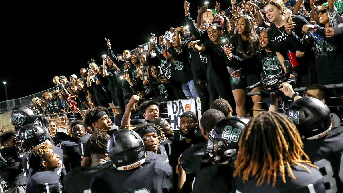 The Mansfield Lake Ridge Eagles celebrate after beating DeSoto, 34-29, Thursday night, September 27, 2018 played at Newsom Stadium in Mansfield, TX.