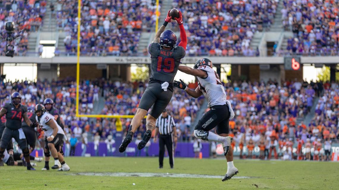 TCU tight end Jared Wiley catches the ball to complete a pass during in their game against OSU at the Amon G. Carter Stadium in Fort Worth on Saturday, Oct. 15, 2022. The final score was 43-40. The Horned Frogs were ranked inside the Top 10 of the coaches’ poll after the win.