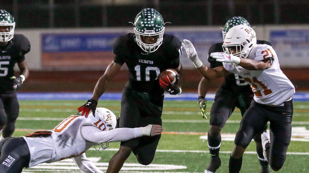Arlington wide receiver Trey Cleveland (10) looks for some running room against Arlington Bowie during the first half, Friday night, October 12, 2018 played at Maverick Stadium in Arlington.
