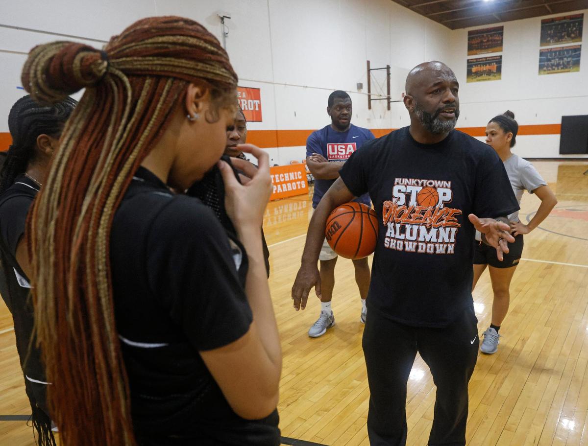 Head coach Nathaniel Hollis coaches the team during a breather during practice at Polytechnic High School outside gym in Fort Worth, Texas, Thursday, Feb. 06, 2025.