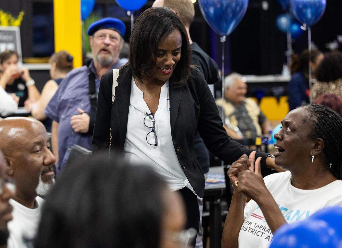 Alisa Simmons who is running for county commissioner district 2 chats with attendees at the election watch party Tuesday, Nov. 8, 2022, at Turkey Den in Fort Worth.