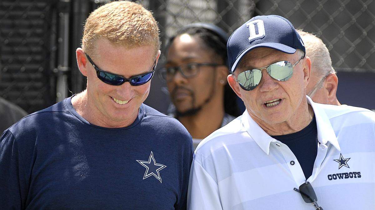 Dallas Cowboys head coach Jason Garrett and owner Jerry Jones talk as they head to the stage for the state of the team address at Cowboys training camp in Oxnard, CA, Wednesday, June 29, 2018.  
