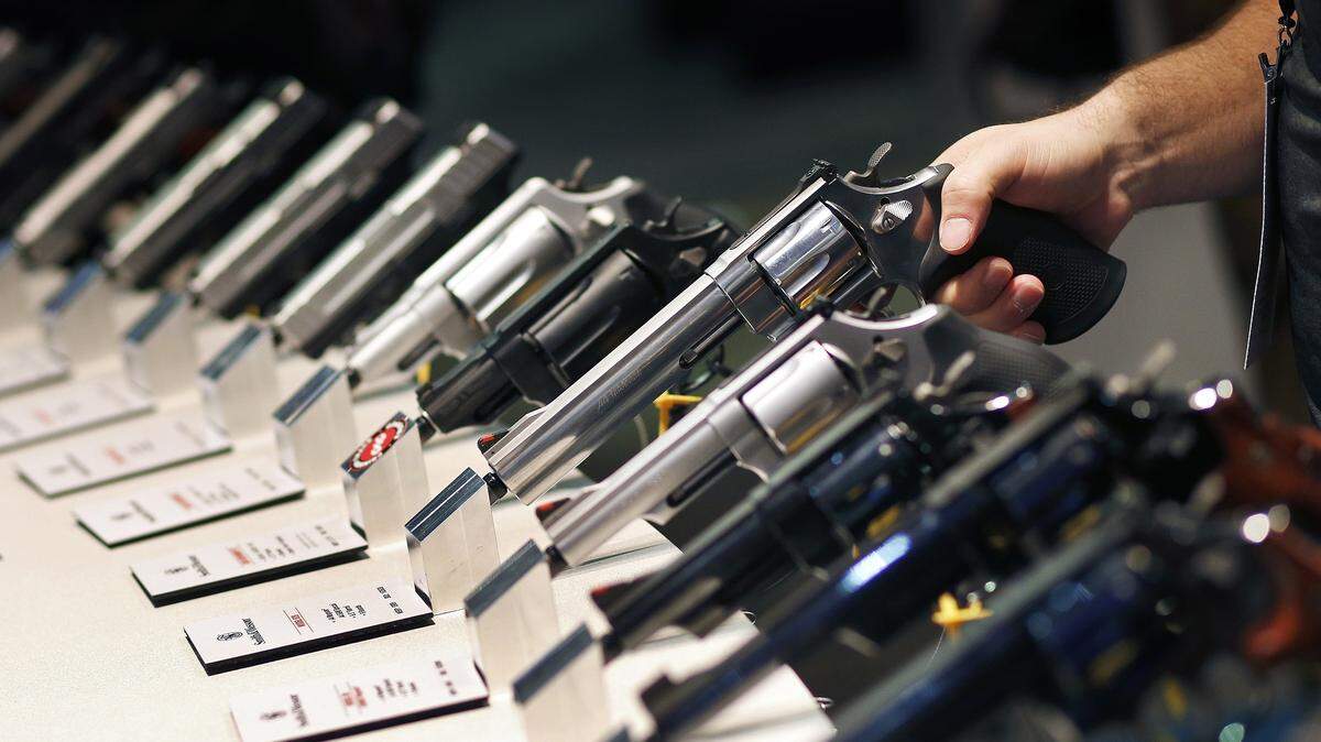 Handguns are displayed at a trade show in Las Vegas in 2016.